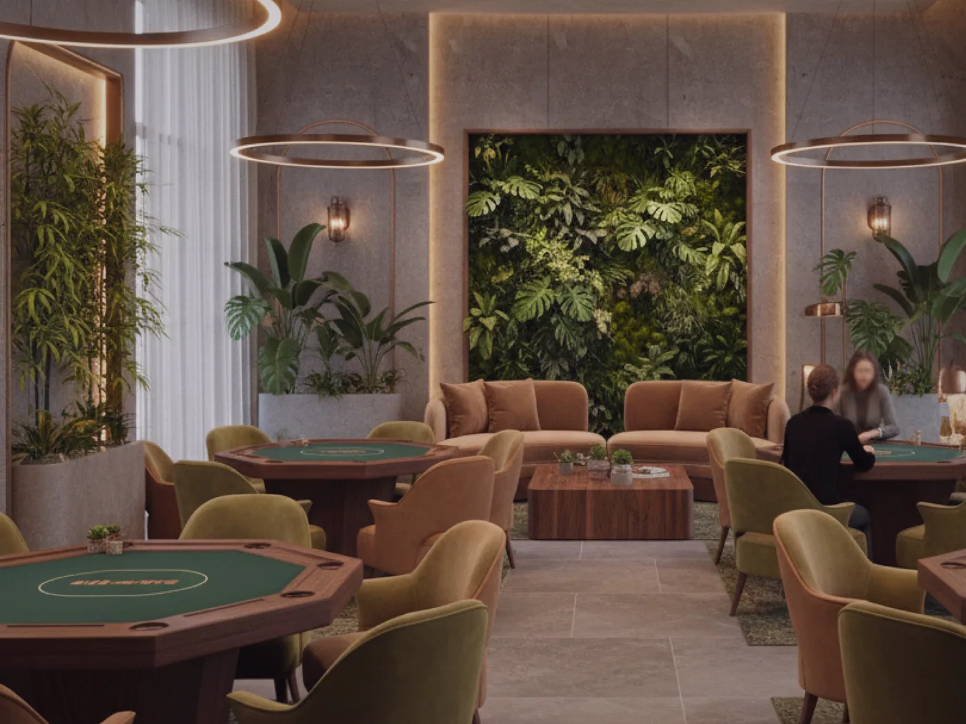 The main card room at Eucalypt Bay with four tables lit under low pendant shades